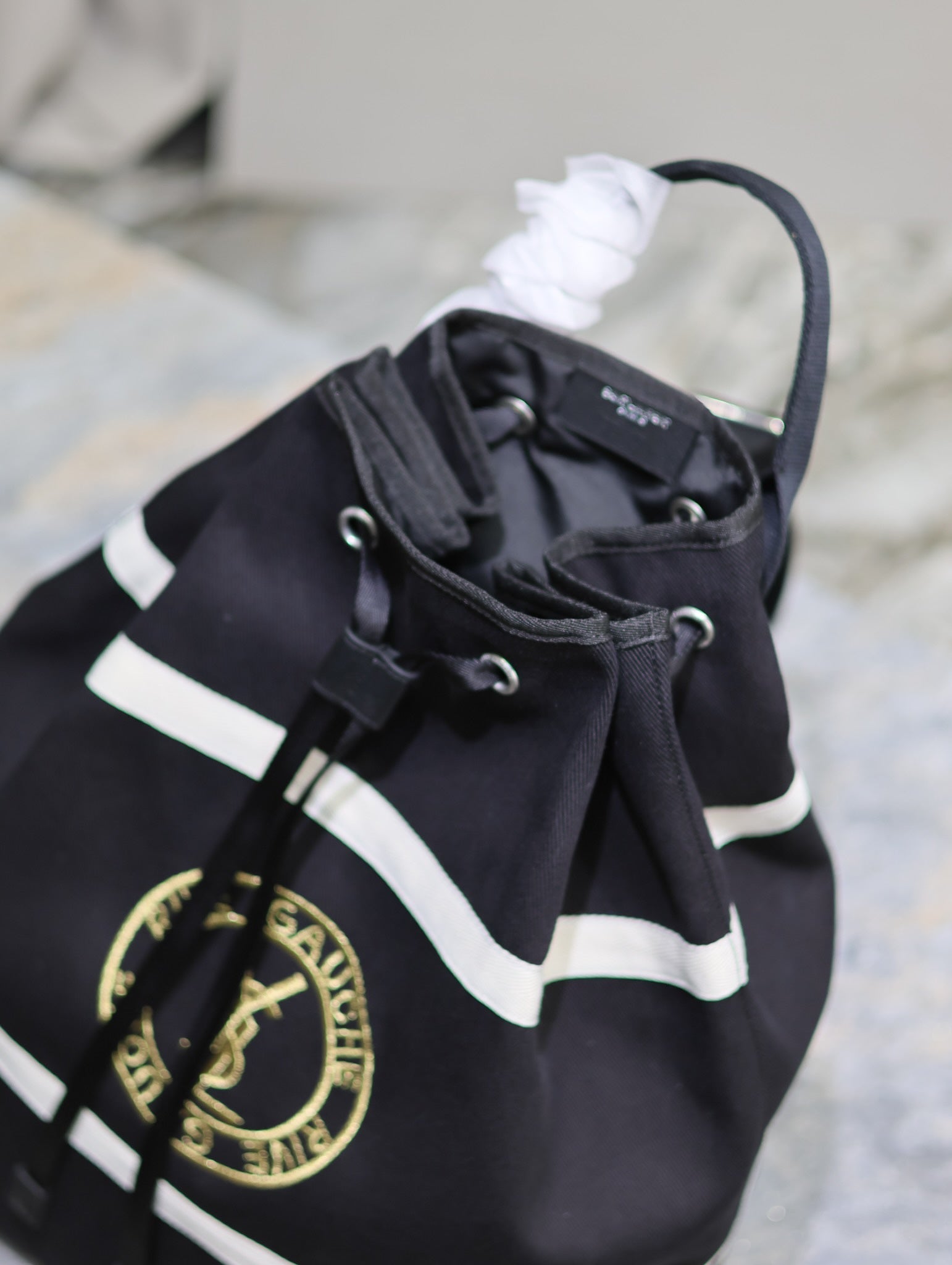 RIVE GAUCHE SAC À DOS 49 EN TOILE NOIRE ET BLANCHE