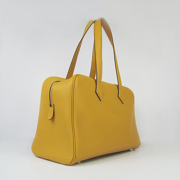 Luxury Hermes Togo leather handbag yellow | Studio Nafay