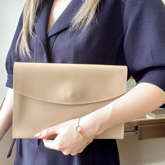 Luxury Hermes leather clutch | Studio Nafay