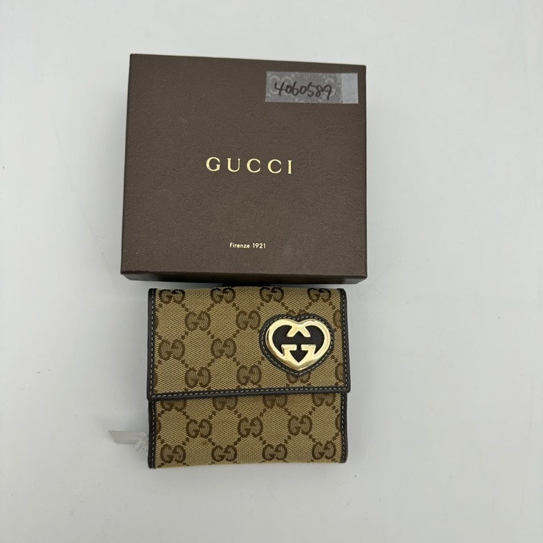 Gucci Beige Canvas GG Logo Clutch Wristlet With Heart Closure | Studio Nafay