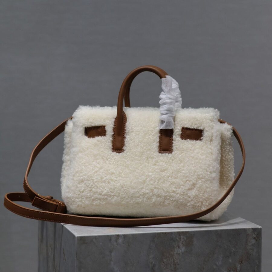 SAC DE JOUR 22 IN WHITE SHEARLING AND BROWN CALFSKIN TRIM | Studio Nafay